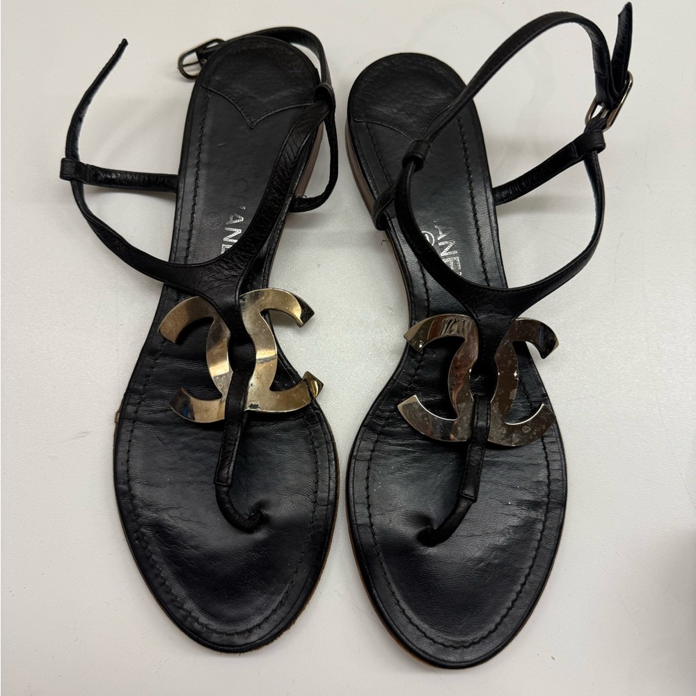 CHANEL Black Sandals with Metallic Gold Logo